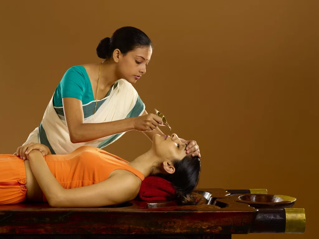 Ayurvedic Nasya therapy procedure under professional supervision